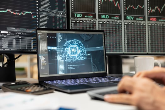 Close up of day trader using AI tech on laptop capitalize on market fluctuations when buying and selling stocks. Prop firm office worker uses artificial intelligence to identify profit opportunities photo
