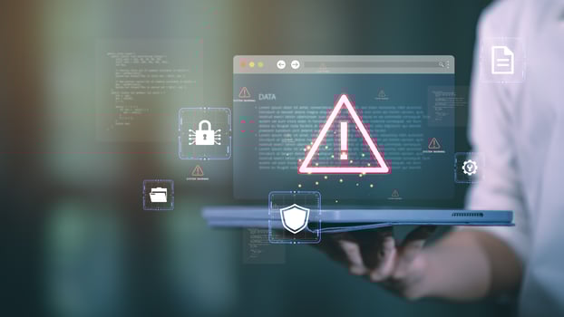 Cybersecurity warning alert on tablet screen with digital lock, shield icons, and system error notifications, symbolizing data breach prevention and online threat protection photo