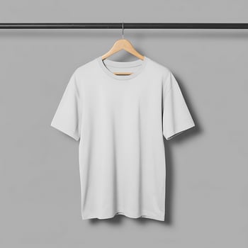 Plain white tshirt hanging on a clothes rack photo
