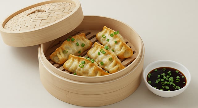 A bamboo steamer with some dumplings inside photo