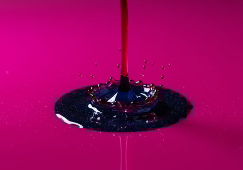 Vibrant Magenta Stream Creates a Glittering Cosmic Crown Splash photo