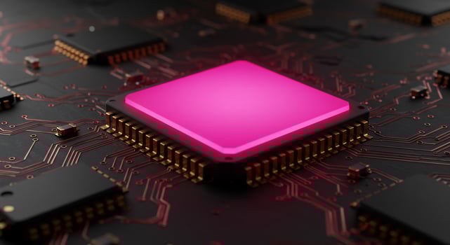 Luminous Pink CPU Core Radiating Energy on a Dark, Intricate Circuit Board photo