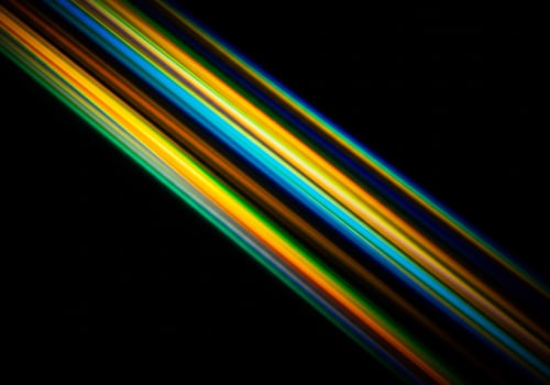 Vibrant Diagonal Light Beams Creating a Prismatic Color Spectrum on Black photo
