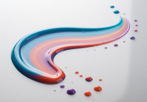 Artistic Swirl of Glossy Multicolored Gel in Blue, Red, and Purple Hues photo