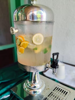 Refreshing Citrus Infused Water in Dispenser photo