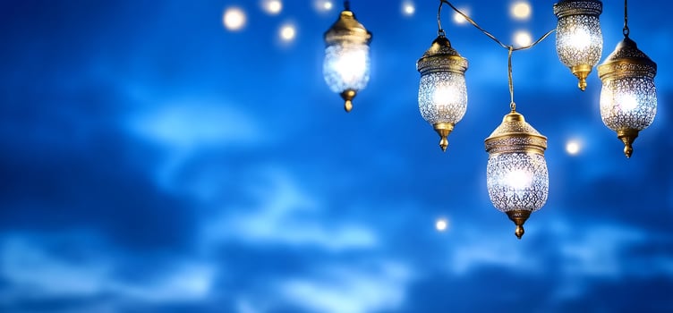 Decorative lanterns hanging on blue background festive celebration ornament photo