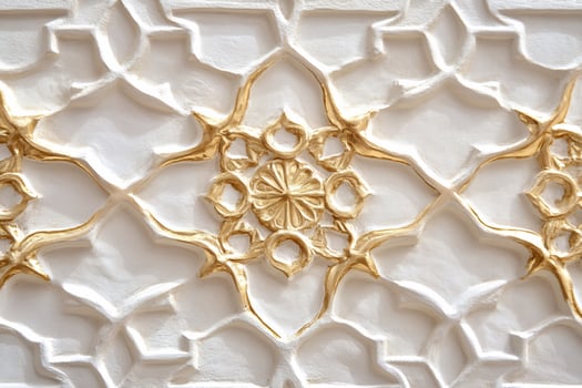 Ornate gold and white geometric floral pattern texture background photo