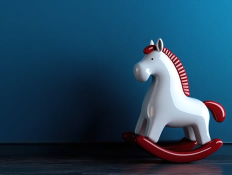 White rocking horse, blue wall, dark floor, childhood memories, toy photo