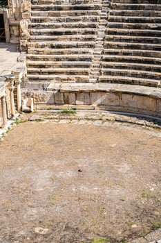 Ancient stone amphitheater or stadium grandstand ruins. Historical architecture, old steps of classic outdoor arena. Editorial use. photo