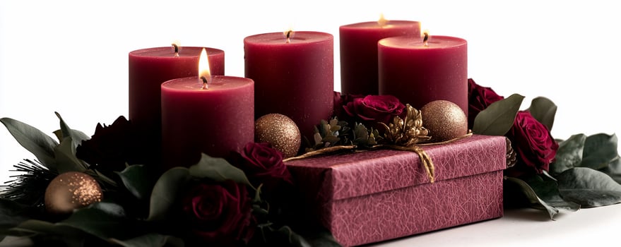 Advent candles, roses, gift, white background photo