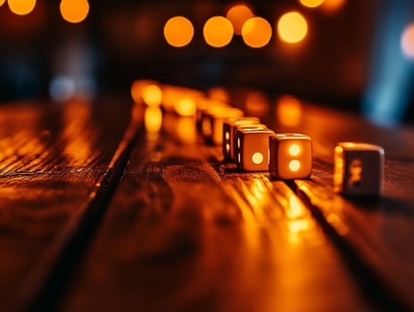 Glowing dice line on wooden table, bokeh background, game night photo