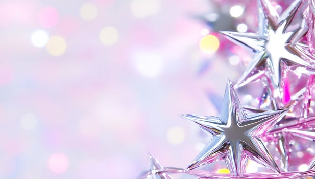 Metallic star ornaments on pink bokeh background festive holiday decoration photo