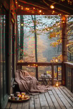 Cozy Cabin Porch Decorated With Warm Lights and Fall Foliage During a Tranquil Autumn Evening photo