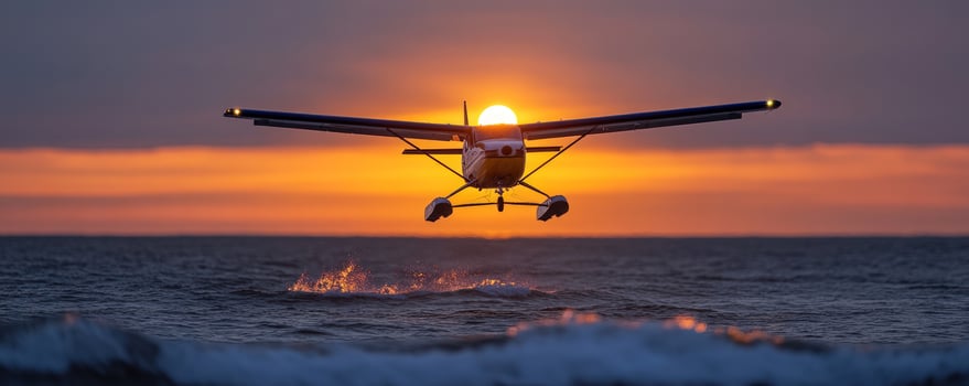 Seaplane sunset ocean waves photo