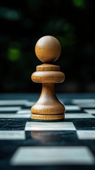 Wooden pawn chess piece outdoors, strategy game, blurred background, business concept photo