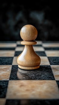 Lone pawn chess piece marble board dark background strategy game photo