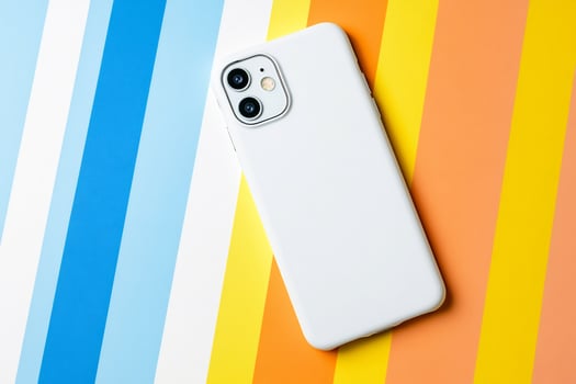 Smartphone on striped background communication technology mobile device photo