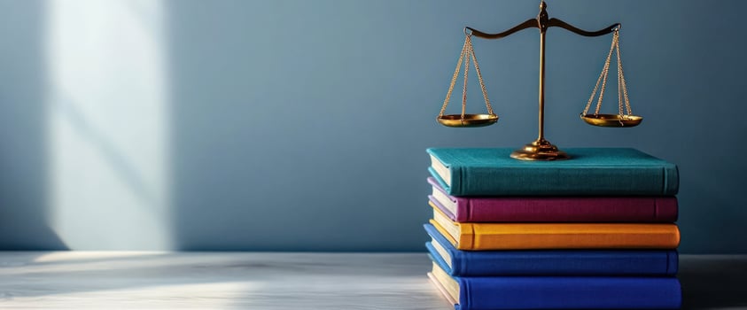 Justice scales on books sunlit room legal concept photo