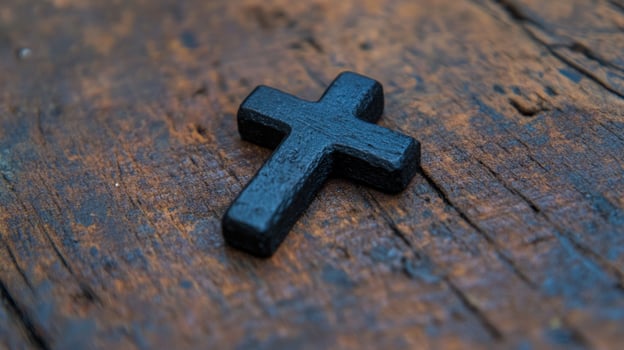 Black cross wooden surface faith hope background religion photo
