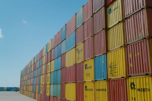 Shipping container stacks in logistics and transportation industry photo