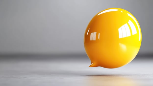 Yellow speech bubble floats in studio photo