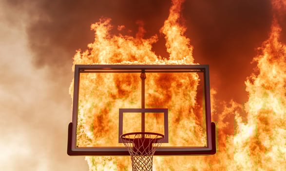Basketball hoop ablaze fiery destruction concept photo