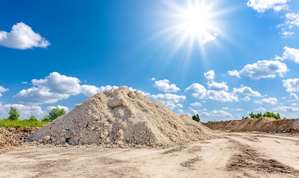 Sand dune under a bright sunny blue sky construction material photo
