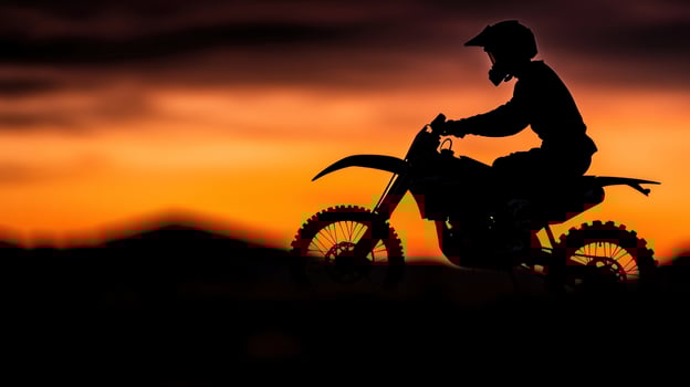 Desert sunset motorbike rider silhouette, adventure, travel poster photo