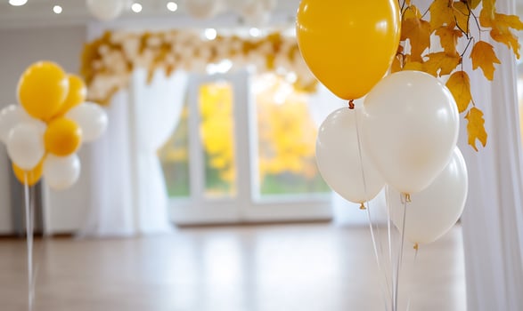 Festive balloons and floral decoration in bright interior space for event or celebration photo