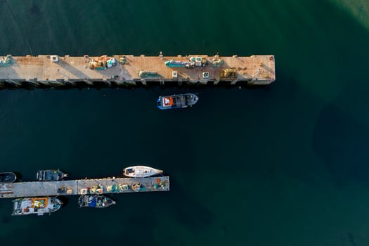 A stunning aerial photograph of a traditional european fishing harbor from above summer vacation concept photo