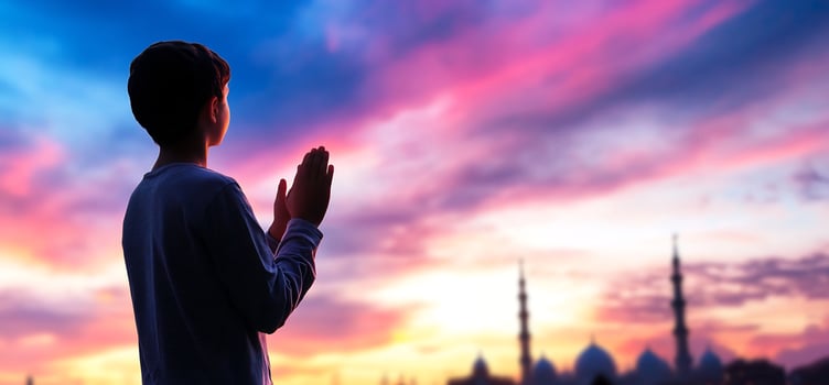 Child prayer at sunset silhouette with mosque landscape photo