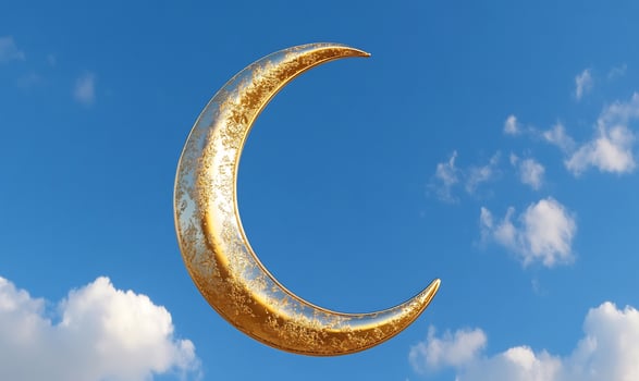 Golden moon in a blue sky celestial symbolism and dreamy concept photo