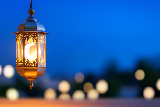 Ornate lantern with moon symbol on dark blue background decoration photo