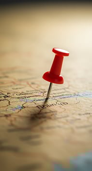 Red Push Pin on Vintage Map photo