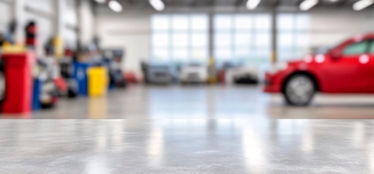 Automotive service center blurred background with surface for product display photo