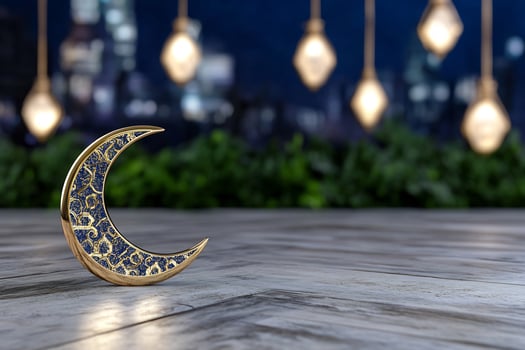 Ornate crescent moon design with soft lighting on textured background photo