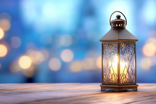 Decorative lantern with candlelight glow and intricate design for festive occasions photo