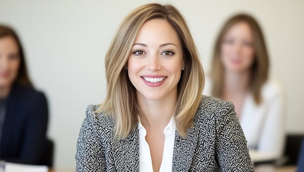 Smiling business woman portrait meeting conference teamwork success professionalism photo