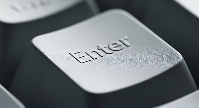 Closeup of Enter Key on Keyboard. photo