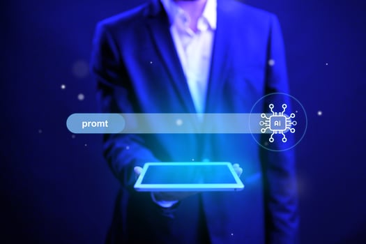 Business professional holding a tablet with futuristic digital interface in dark environment shows advanced technology trends photo