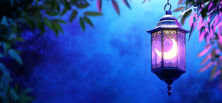 Hanging lantern with moon in soft blue night background festive decoration photo