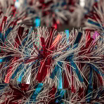 Festive Red White and Blue Tinsel Garland CloseUp. photo