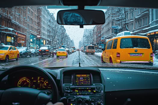 A view from inside a car on a snowy street photo