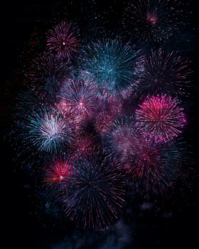 Vibrant fireworks display in night sky. photo