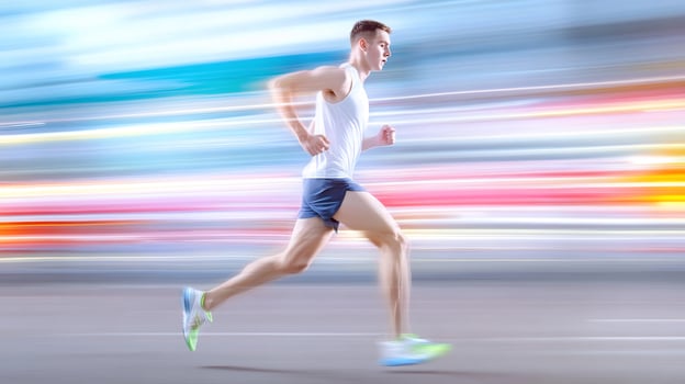 Athlete running in motion blur speed and energy concept healthy lifestyle photo