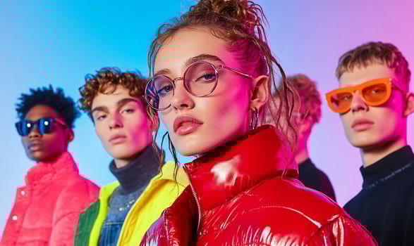 Stylish young adults with fashionable eyewear and colorful clothing photo