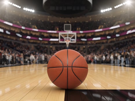 An action-packed basketball court with a basketball in focus, surrounded by an enthusiastic crowd. photo