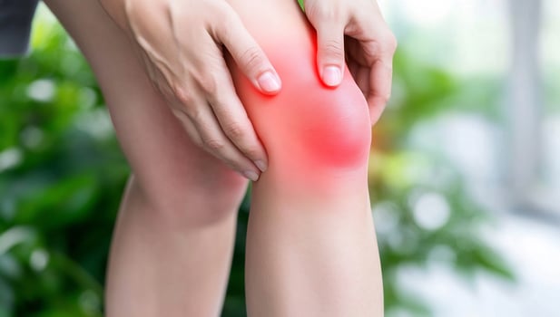 Knee pain and inflammation medical condition close up photo