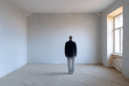 A lone figure, silhouetted in ephemeral solitude, evokes surreal introspection and Empty Room Day contemplation photo