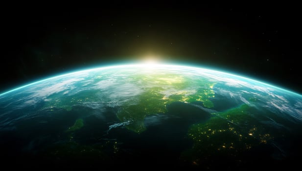 Earth from space at sunrise globe with city lights view photo